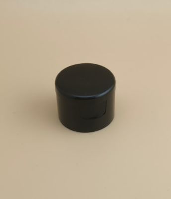 Bouchon rond lisse en plastique noir pour flacons cosmétiques
