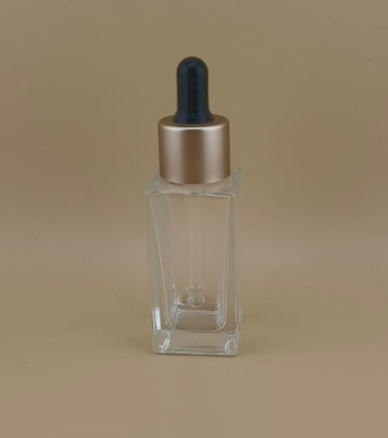 Flacon compte-gouttes d'essence pour le visage avec bouchon à vis doré, petit et transparent