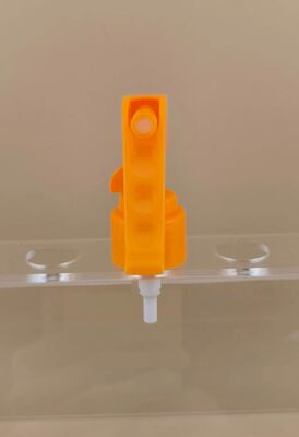 Mini pulvérisateur à gâchette en plastique orange pour la coiffure