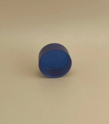 Délicatement conçu, le capuchon en plastique bleu foncé pour les bouteilles de soins de la peau