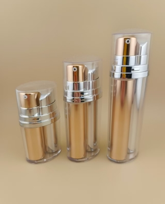 Flacon pompe airless bicolore doré et argenté avec revêtement extérieur pour produits cosmétiques et de soin de la peau