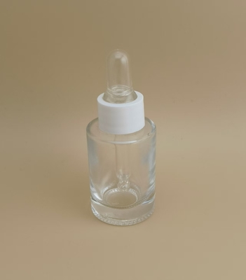 Mini bouteille compte-gouttes ronde lisse et transparente pour essence
