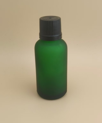 Bouteille en verre vert foncé pour l'essence