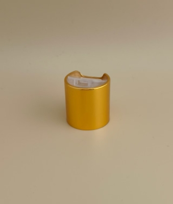 Bouchon rond jaune en aluminium-plastique avec bouton clair pour les bouteilles de soins de la peau
